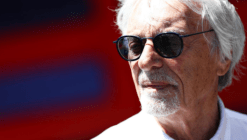Bernie Ecclestone wearing sunglasses