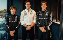 Kimi Antonelli sits with George Russell and Mercedes boss Toto Wolff