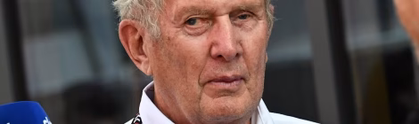 Marko wearing his red bull shirt and f1 lanyard