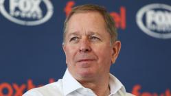 Brundle looking forward at the camera