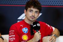 Leclerc with a microphone