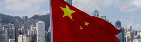 Chinese flag with Hong Kong skyline