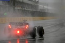 Formula 1 car racing in rain