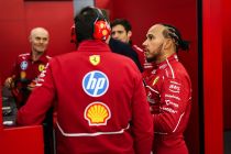 Ferrari team discussing race strategy.