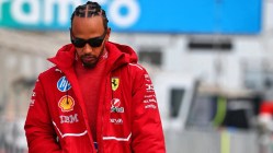 Hamilton in red jacket walking