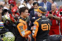 Two McLaren drivers discussing strategy.