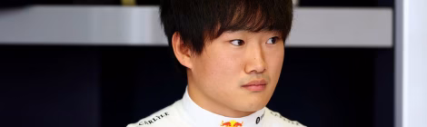 Tsunoda driver in team uniform.