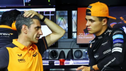 Stella and Norris discussing topics on the pit wall