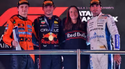 Drivers celebrate with trophies