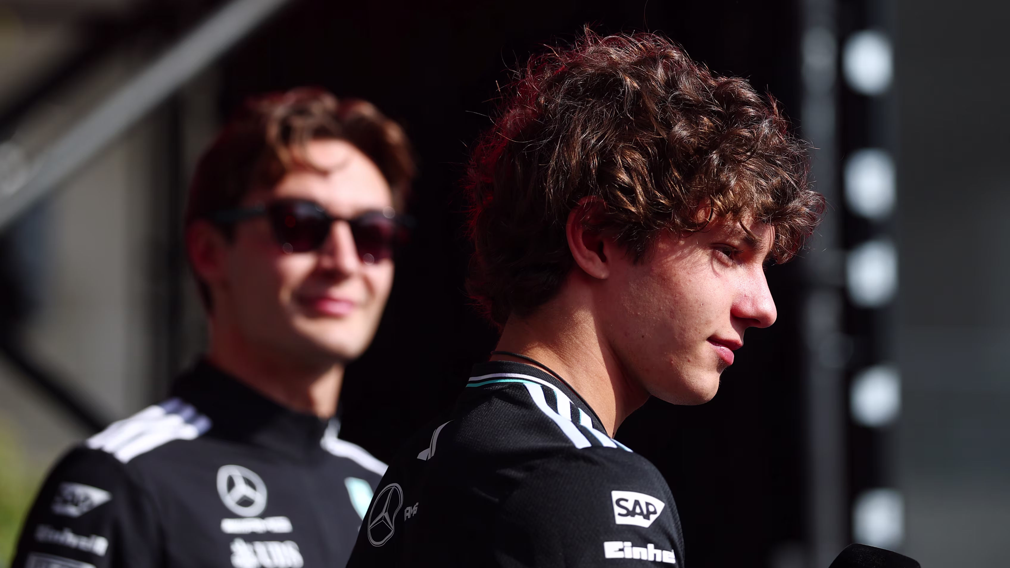 2 mercedes drivers in the paddock